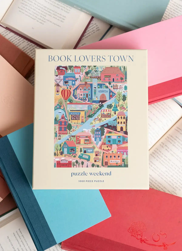 Puzzle box titled 'Book Lovers Town' on a background of open books