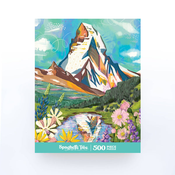 Jigsaw puzzle box with art of the Matterhorn mountain and nature design, featuring the brand 'Spaghetti Tree'.