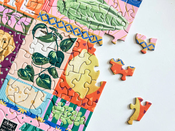 Colorful puzzle with floral and farm design on a white background