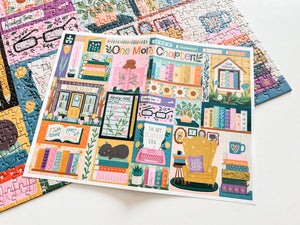 Colorful puzzle pieces with a book-themed design on a white surface