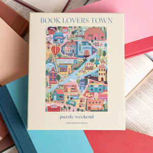 Puzzle box titled 'Book Lovers Town' on a background of open books