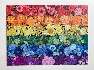 Colorful floral puzzle with a rainbow gradient on a white background