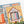 Jigsaw puzzle with a colorful design of a little library on a white background