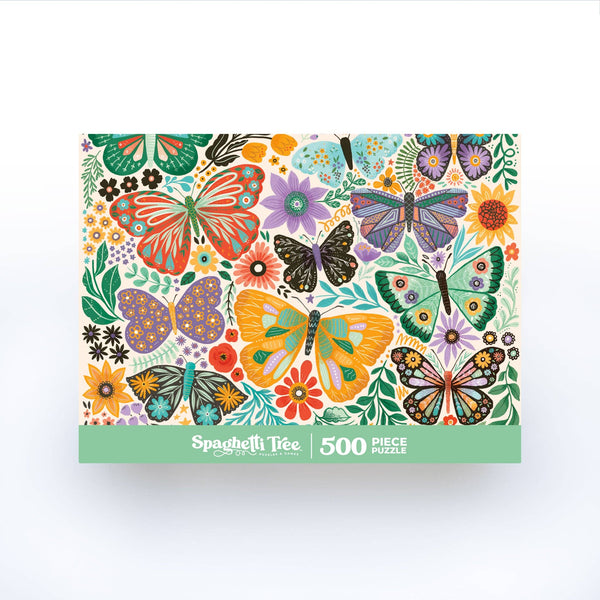 Jigsaw puzzle box with colorful butterfly and floral design on a white background