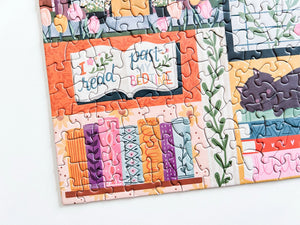 Colorful puzzle with a floral book design and text on a white background