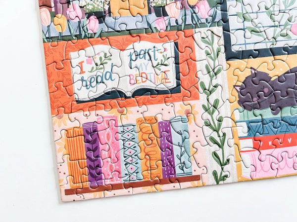 Colorful puzzle with a floral book design and text on a white background