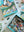 Jigsaw puzzle with pieces and packaging on a white surface