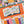Colorful puzzle with book-themed design on a white background