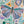 Colorful puzzle close-up with a illustrated butterfly design surrounded by flowers and leaves