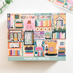 A 1000-piece jigsaw puzzle box titled 'One More Chapter' by Spaghetti Tree, featuring a colorful collage of cozy book-themed illustrations on a white background.