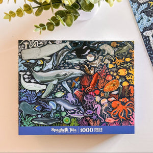 Spaghetti Tree 1000 piece puzzle with gradient ocean-themed design on a light surface.