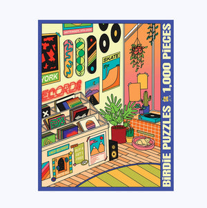 Jigsaw puzzle box against a white surface. Box shows illustration of a record store with skate board artwork and posters on the wall above a rack of record albums.
