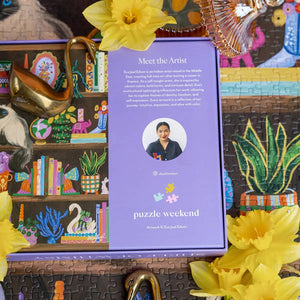 Jigsaw puzzle with a purple information card featuring an artist's portrait and text, surrounded by yellow flowers.