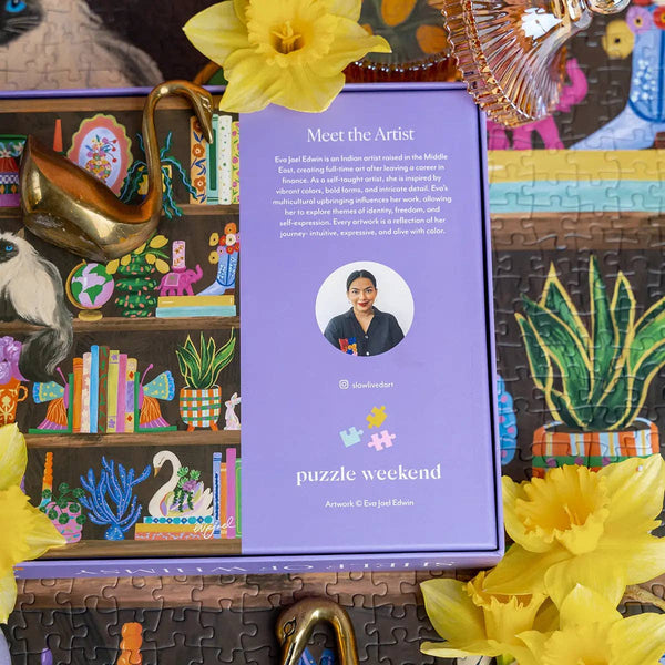 Jigsaw puzzle with a purple information card featuring an artist's portrait and text, surrounded by yellow flowers.