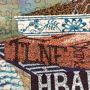 Close-up of a puzzle with detailed patterns and decorative motifs