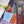 Colorful puzzle close-up of a potted tree on a white surface