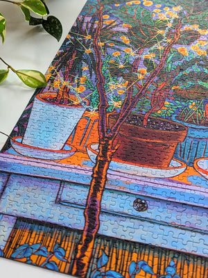 Jigsaw puzzle with a colorful design of potted plants on a table
