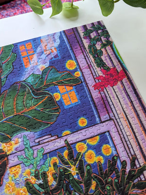 Colorful puzzle with a completed section featuring plants and buildings.