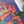 Close up of Girls Night puzzle showing women enjoying each others company and a small cat sleeping on a pillow. 