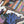 Partial puzzle with colorful design featuring an illustration of a vase of flowers, books, and plants.