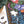 Colorful puzzle with cat design and scattered pieces on a white surface