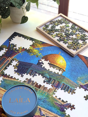 Partially completed puzzle showing an illustration of a domed building with a pool and pigeons, framed by an archway.