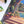 Close up of completed puzzle showing corner of illustration featuring steps, an arched doorway and potted plants.