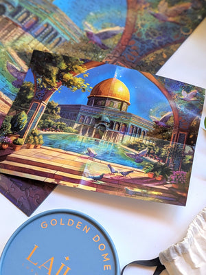 Print of the poster illustration on top of completed puzzle and near top of tube box and cotton bag. 