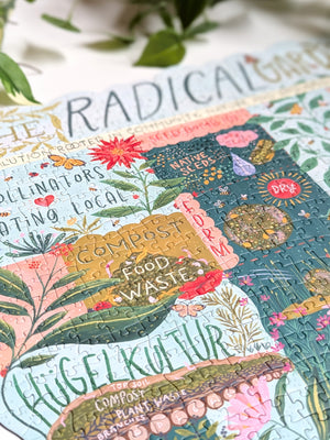 A close-up of a completed jigsaw puzzle featuring colorful text and botanical illustrations.