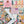 Jigsaw puzzle with a colorful book-themed design on a matching out of focus background of the completed puzzle