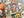 A 500-piece jigsaw puzzle box by Spaghetti Tree, featuring a colorful Day of the Dead/Halloween illustration with sugar skulls, jack-o'-lanterns, butterflies, and candles, shown resting on a matching patterned puzzle surface.