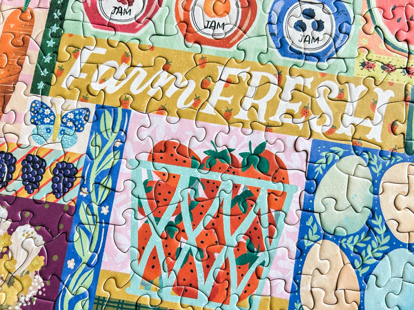 Colorful puzzle with 'Farm Fresh' text and various food related illustrations.