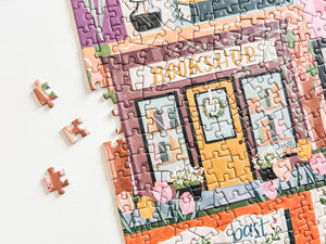 Jigsaw puzzle of a bookshop with missing pieces on a white background