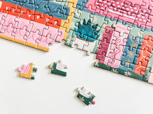 Colorful puzzle with some pieces missing on a white background