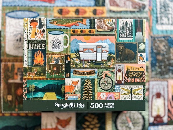 Spaghetti Tie 500 piece puzzle box with various camping illustrations in a grid pattern.