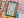 Close-up of a puzzle with colorful pieces featuring library card and other book-themed illustrations.