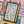 Close-up of a puzzle with colorful pieces featuring library card and other book-themed illustrations.