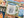 Jigsaw puzzle with 'Happy Camper' design and various outdoor-themed pieces.