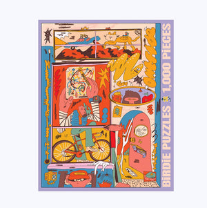 Jigsaw puzzle box against a white surface. Box shows illustration of a funky apartment building with inset pictures of little scenes of urban life.
