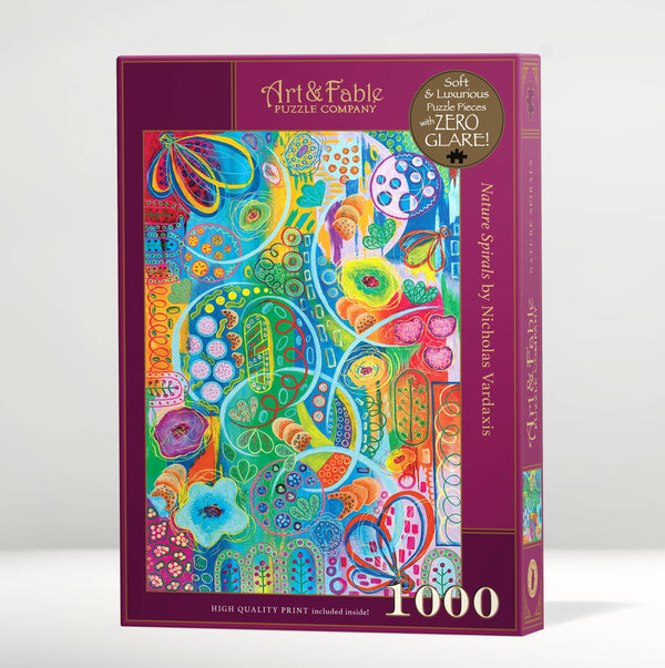 Jigsaw puzzle box with colorful abstract design and 'Art & Fable' branding on a white background